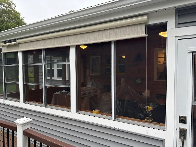Old aluminium windows on a porch in Wilton,CT